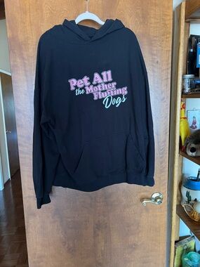 Assholes Live Forever All The Dogs Black Graphic Hooded Sweatshirt.